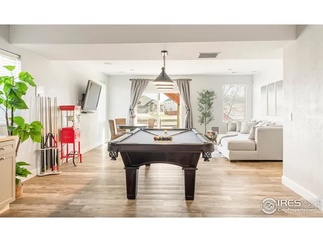 a bathroom with a sink a mirror and vanity