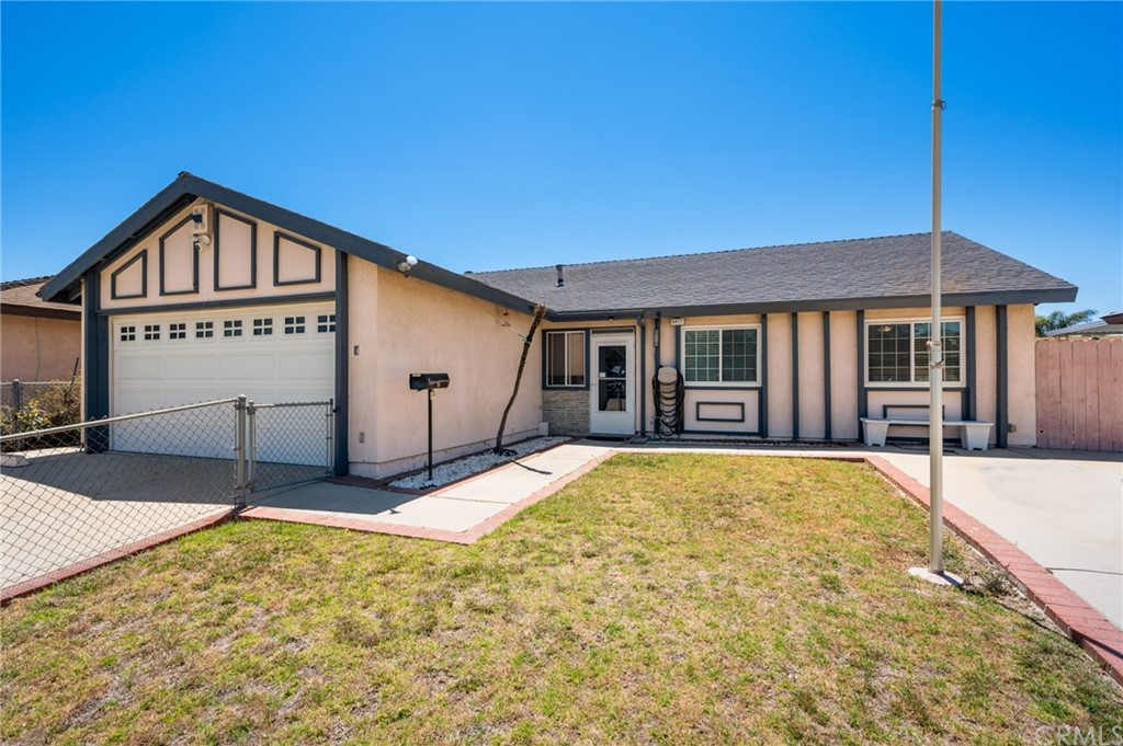 4411 Boston Way Oxnard, CA 93033 - Photo 1 of 1 a front view of a house with garden