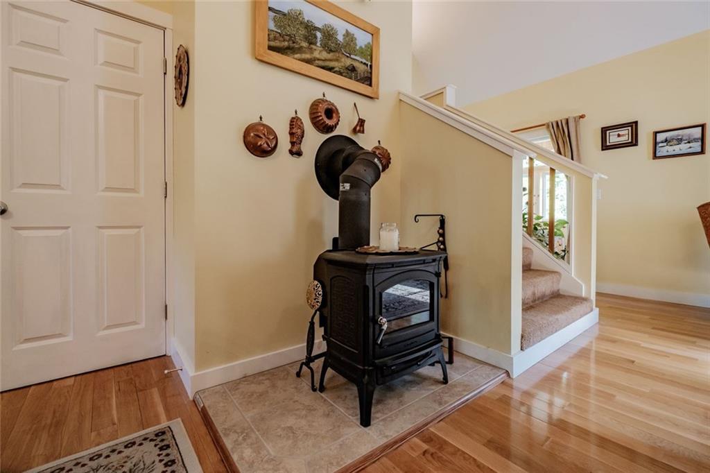 71 Hardscrabble Road Sweden, ME 04040 - Photo 18 of 35 Wood stove looking in living room