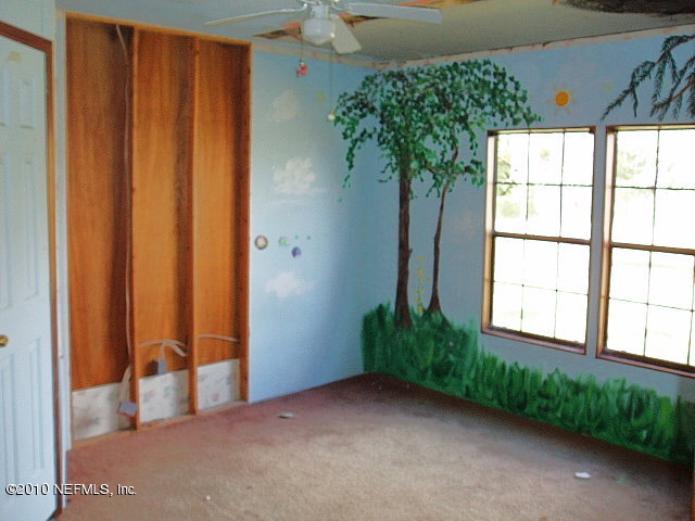 45193 Bismark Road Callahan, FL 32011 - Photo 8 of 11 a view of an empty room with a window