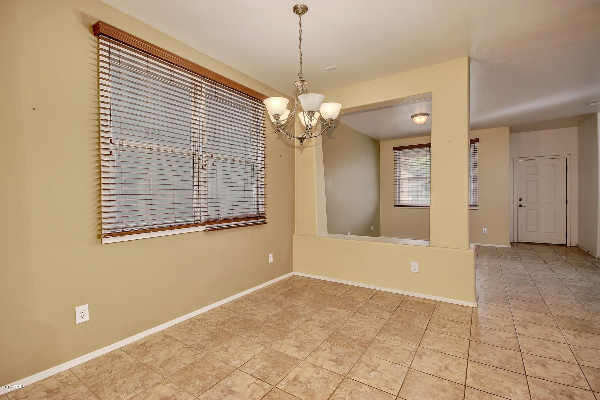 2328 East Fraktur Road Phoenix, AZ 85040 - Photo 8 of 26 a view of livingroom with window