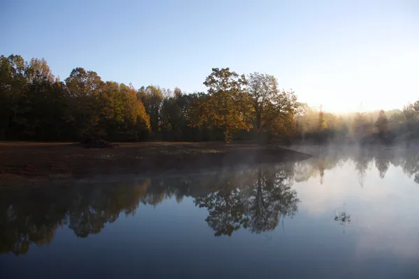 a view of lake with green space