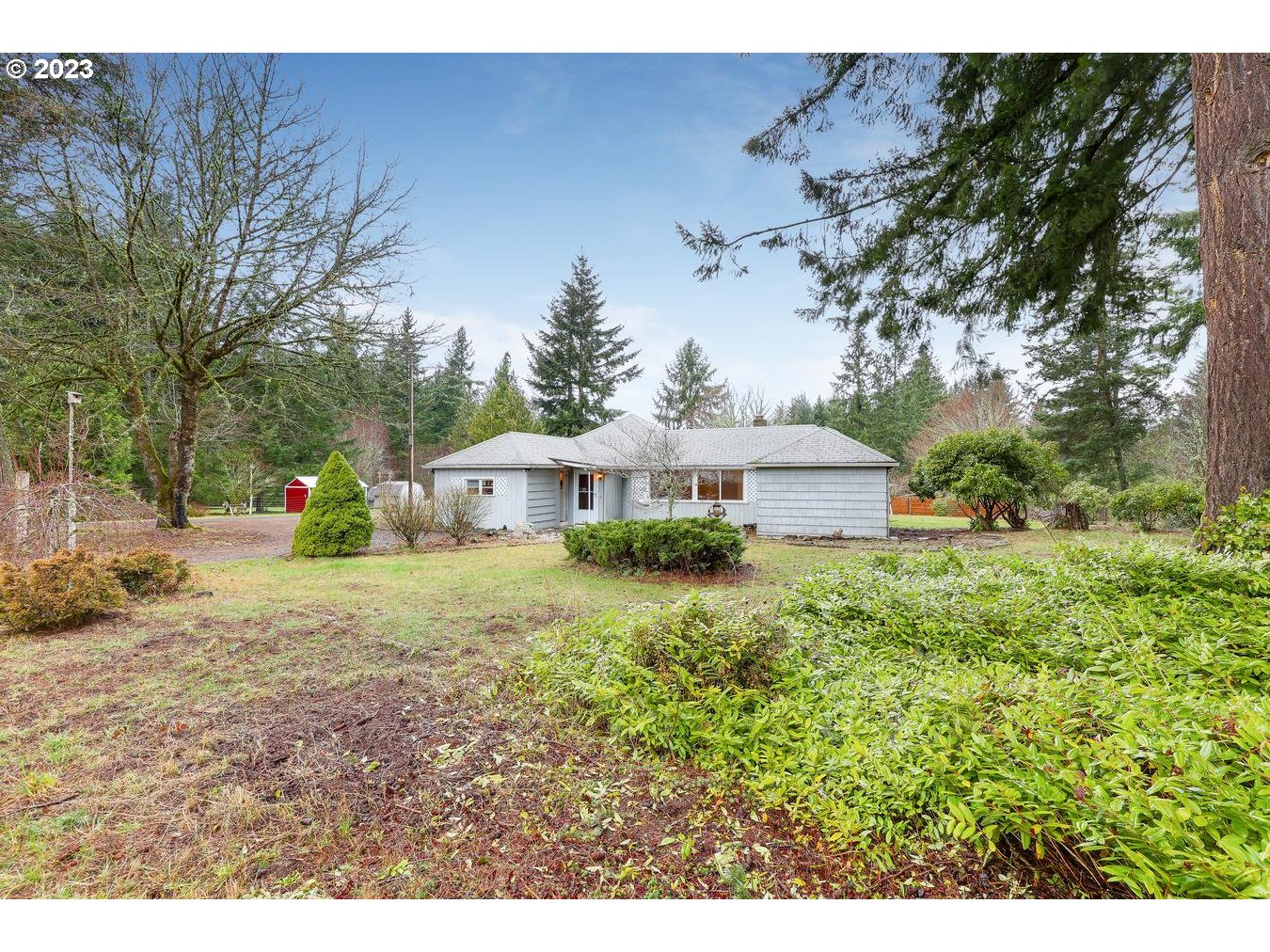 a view of a house with a yard