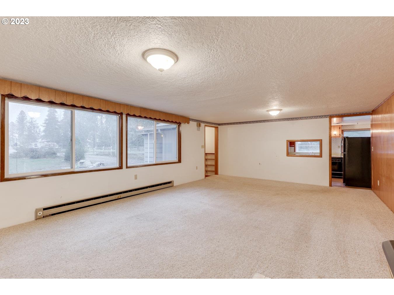 39161 Southeast Rude Road, Unit B Sandy, OR 97055 - Photo 12 of 32 a view of an empty room with a window