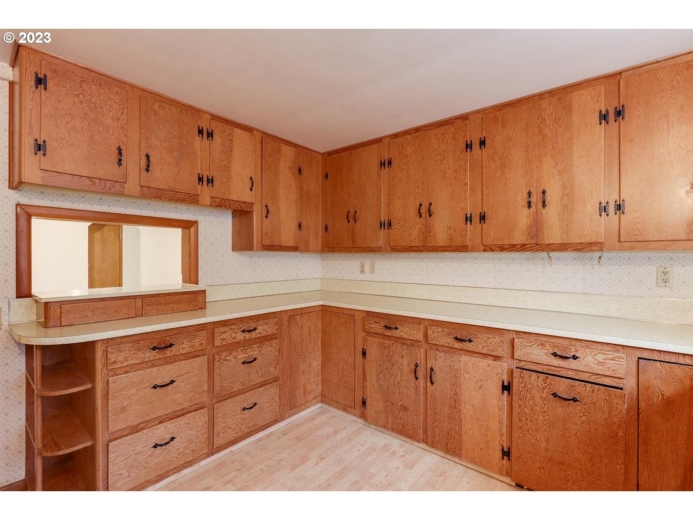 39161 Southeast Rude Road, Unit B Sandy, OR 97055 - Photo 14 of 32 a kitchen with granite countertop white cabinets and stainless steel appliances