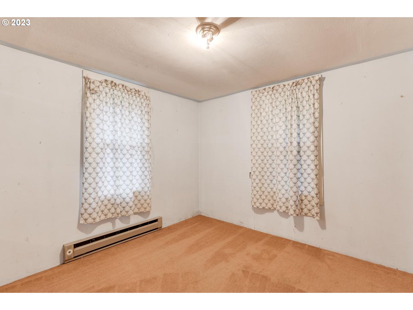 39161 Southeast Rude Road, Unit B Sandy, OR 97055 - Photo 21 of 32 a view of an empty room with a window
