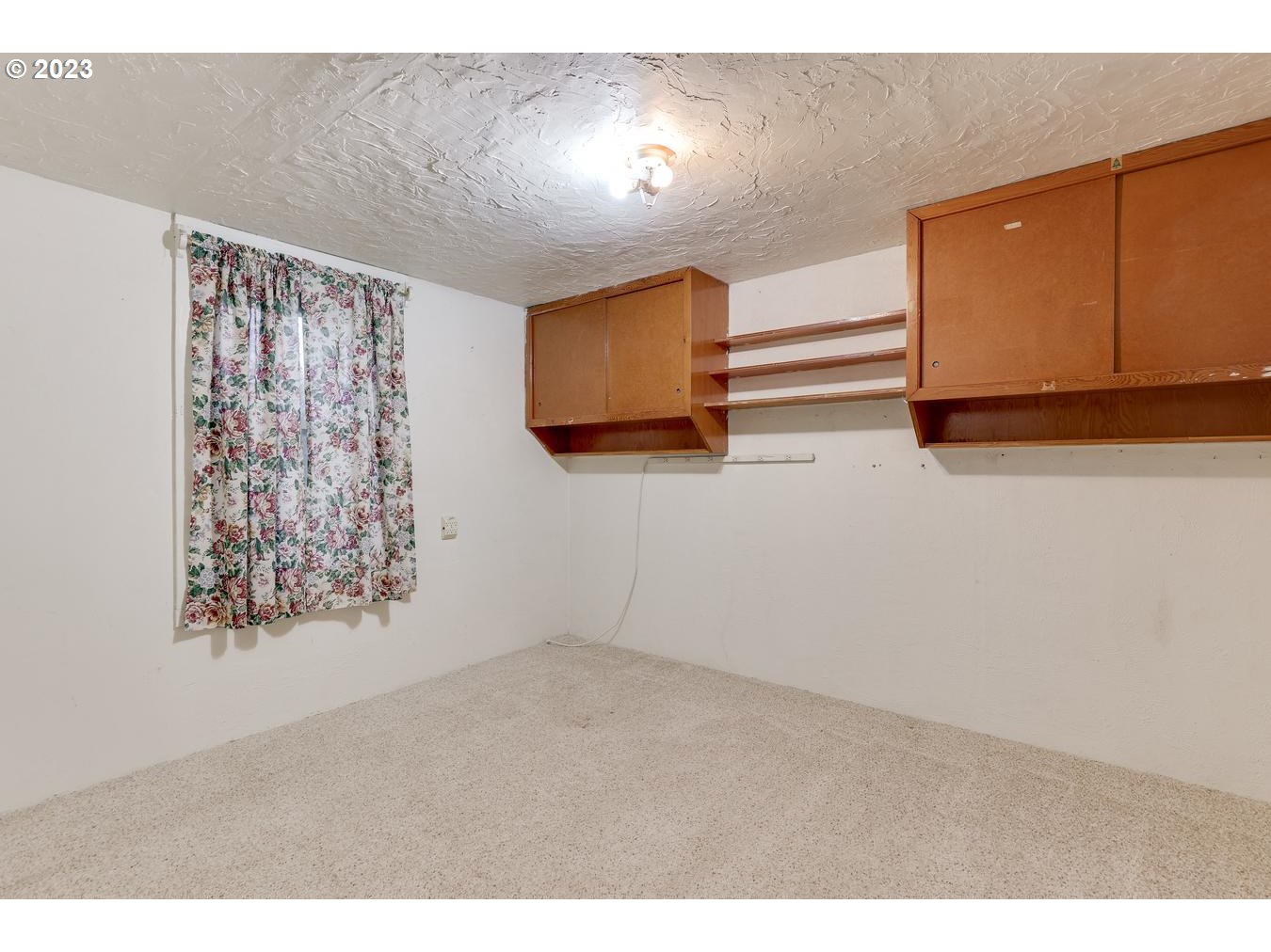 39161 Southeast Rude Road, Unit B Sandy, OR 97055 - Photo 24 of 32 a view of an empty room with a window