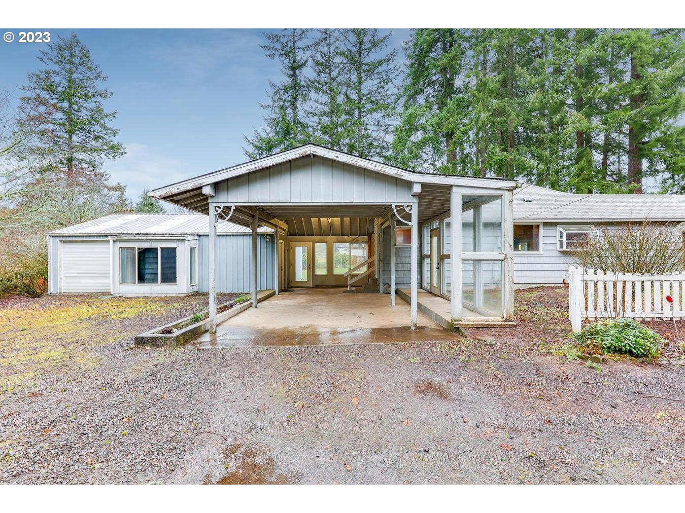 39161 Southeast Rude Road, Unit B Sandy, OR 97055 - Photo 27 of 32 a view of a house with a yard and large tree
