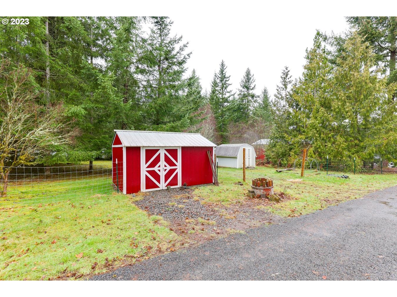 39161 Southeast Rude Road, Unit B Sandy, OR 97055 - Photo 4 of 32 a view of outdoor space with sign board