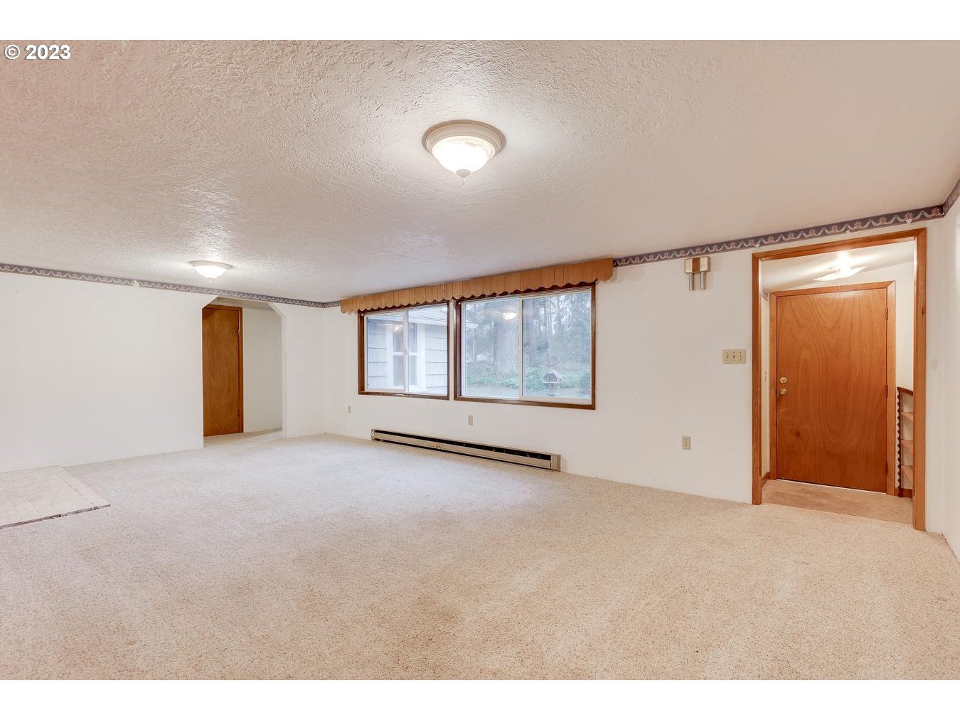 39161 Southeast Rude Road, Unit B Sandy, OR 97055 - Photo 10 of 32 a view of an empty room with a window