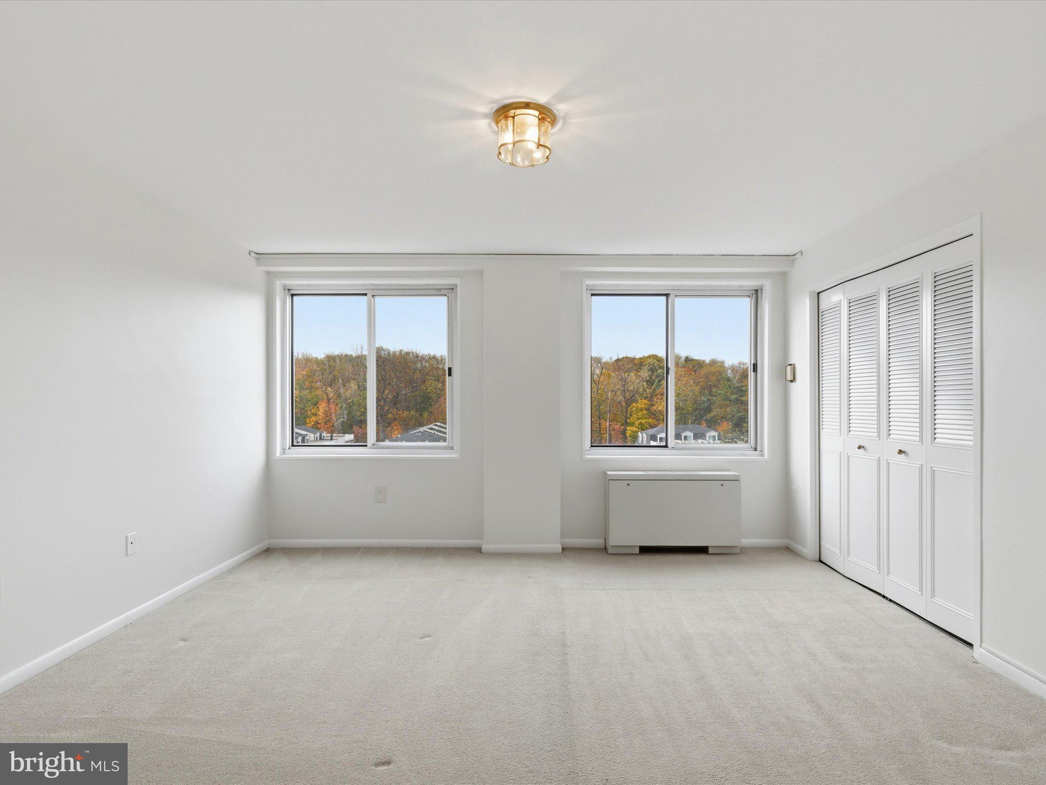 10201 Grosvenor Place, Unit 1001 Rockville, MD 20852 - Photo 27 of 49 Primary Bedroom