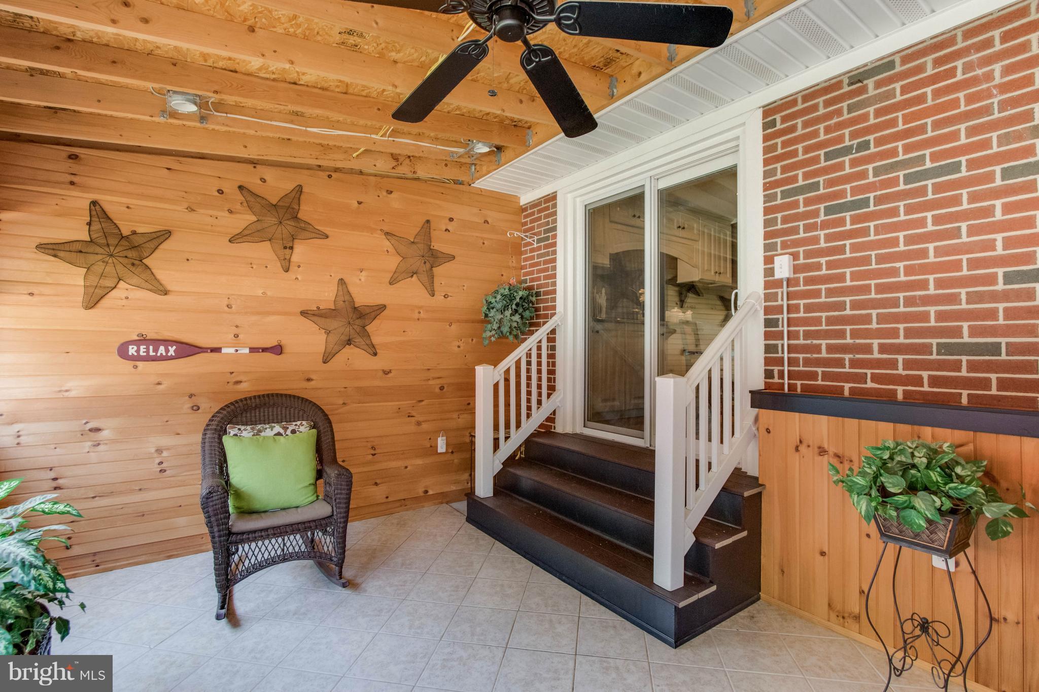 720 East Maple Road Linthicum, MD 21090 - Photo 23 of 30 Huge enclosed porch with steps from Kitchen
