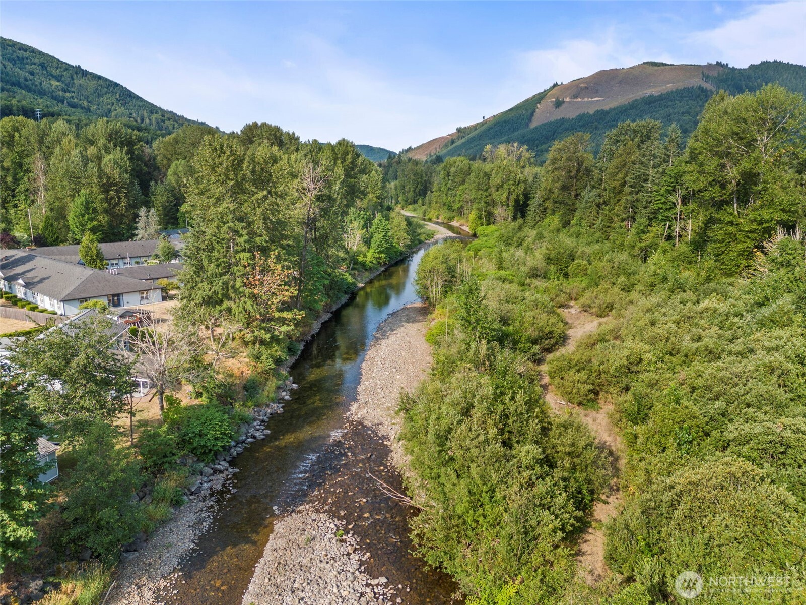 841 West Main Morton, WA 98356 - Photo 15 of 27 a view of a garden with a building in the background