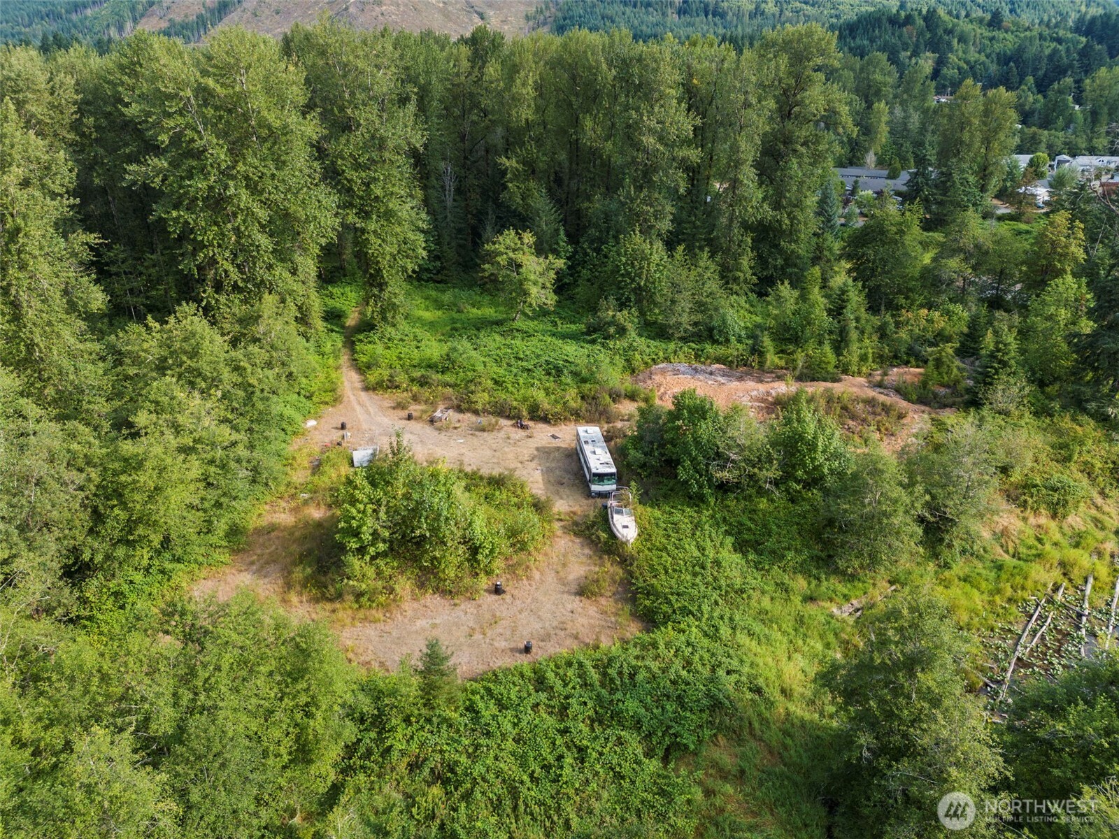 841 West Main Morton, WA 98356 - Photo 25 of 27 a view of a garden with a tree