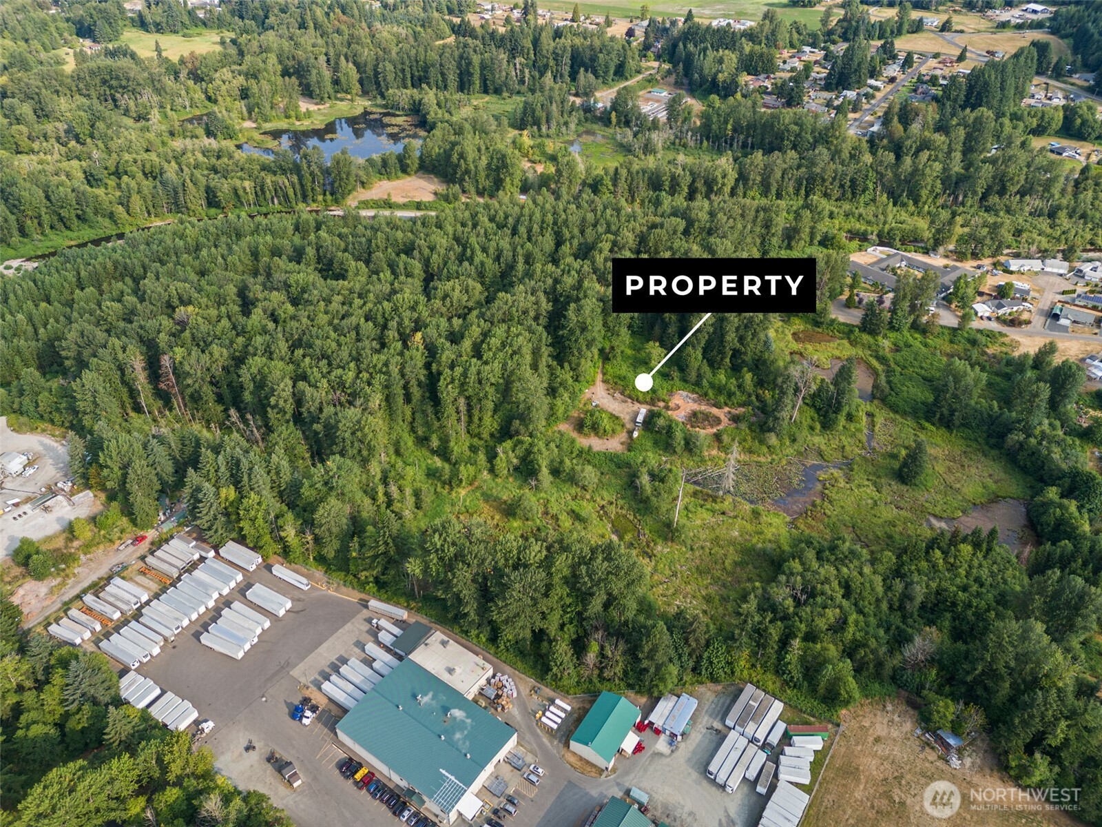 841 West Main Morton, WA 98356 - Photo 4 of 27 an outdoor space with seating area and trees