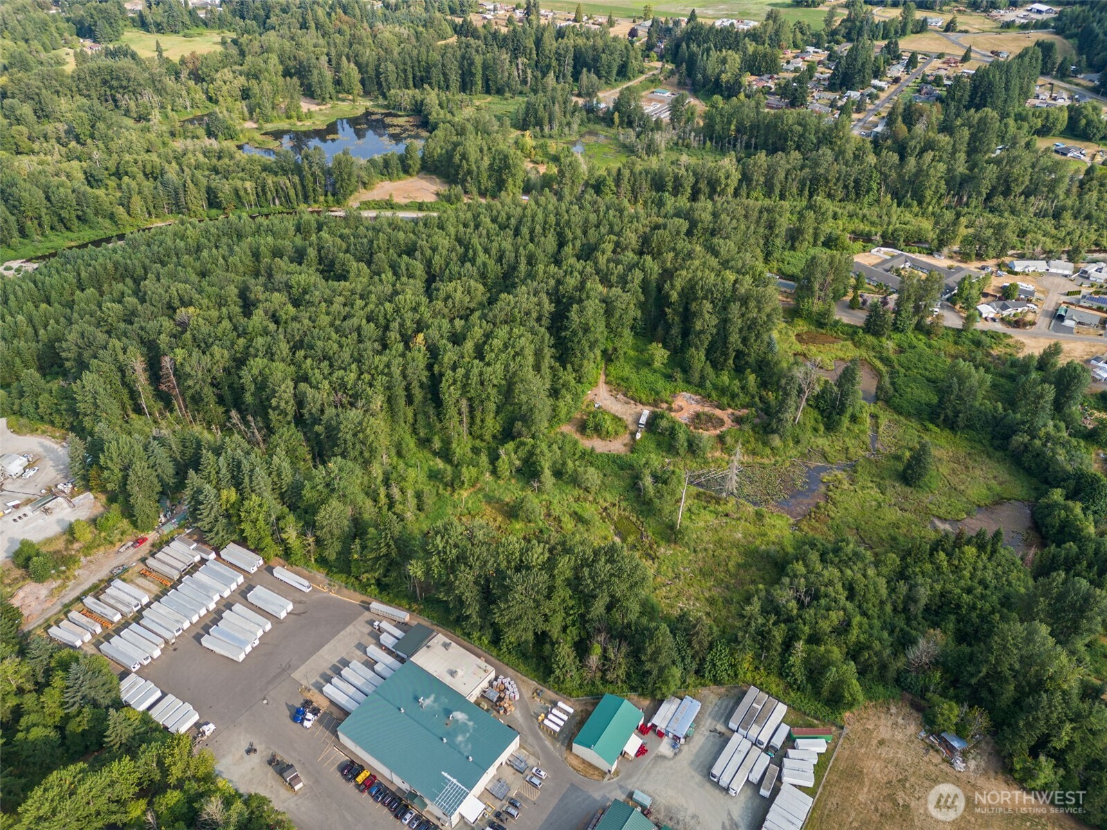 841 West Main Morton, WA 98356 - Photo 6 of 27 an aerial view of a house with a yard