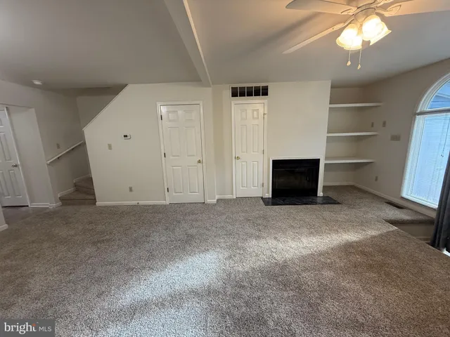 a view of a chandelier and window in a room