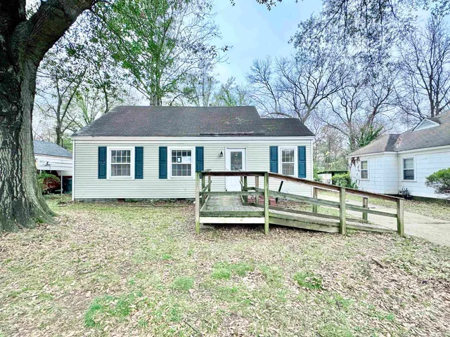 a house view with a garden space