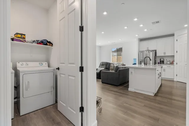 a utility room with dryer and washer