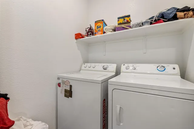 a storage room with washer and dryer