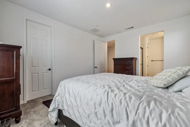 a bathroom with a double vanity sink and mirror