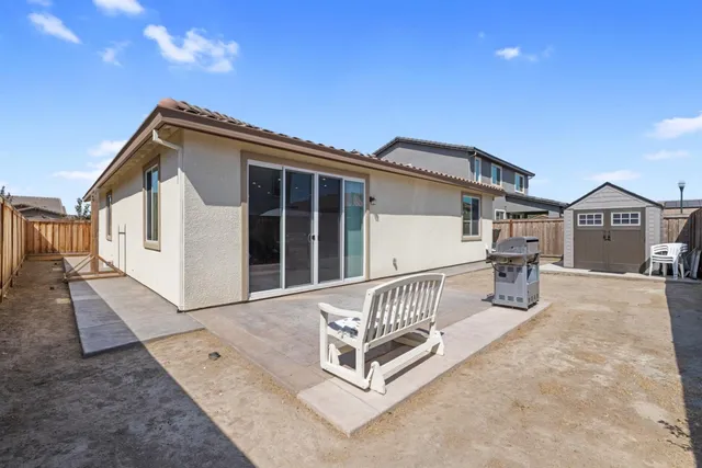a view of outdoor space and wooden fence