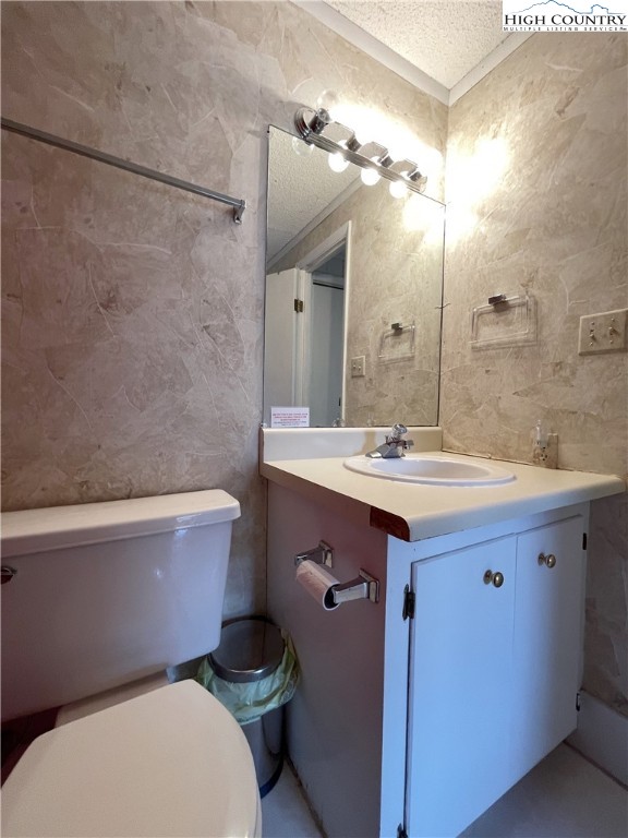 102 Skiview Lane, Unit A3 Beech Mountain, NC 28604 - Photo 13 of 20 a bathroom with a granite countertop toilet sink and mirror