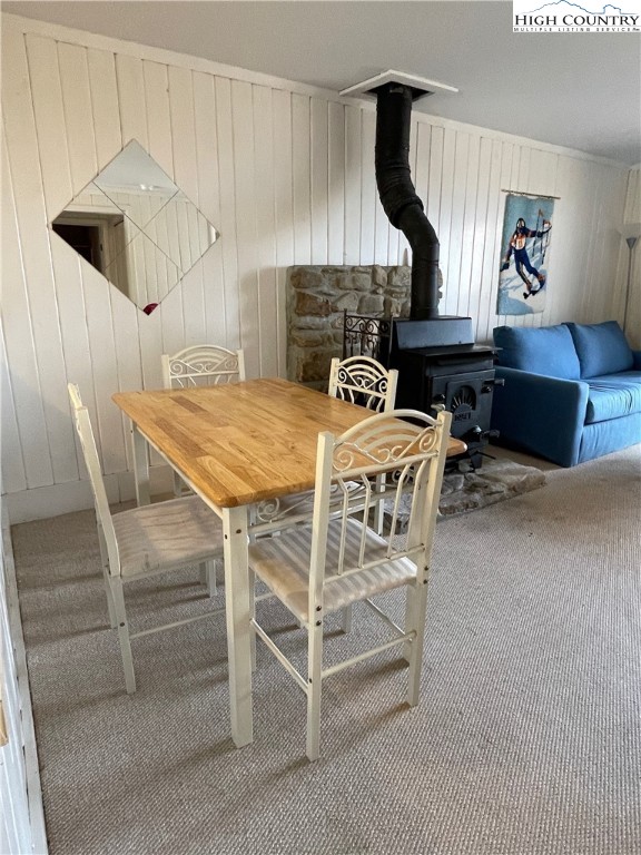 102 Skiview Lane, Unit A3 Beech Mountain, NC 28604 - Photo 5 of 20 a dining room with furniture and wooden floor