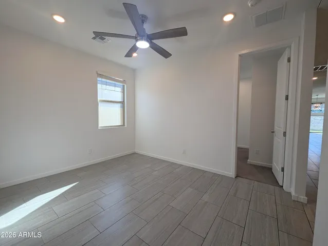 a bathroom with a shower and sink