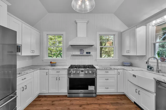 a utility room with washer and dryer