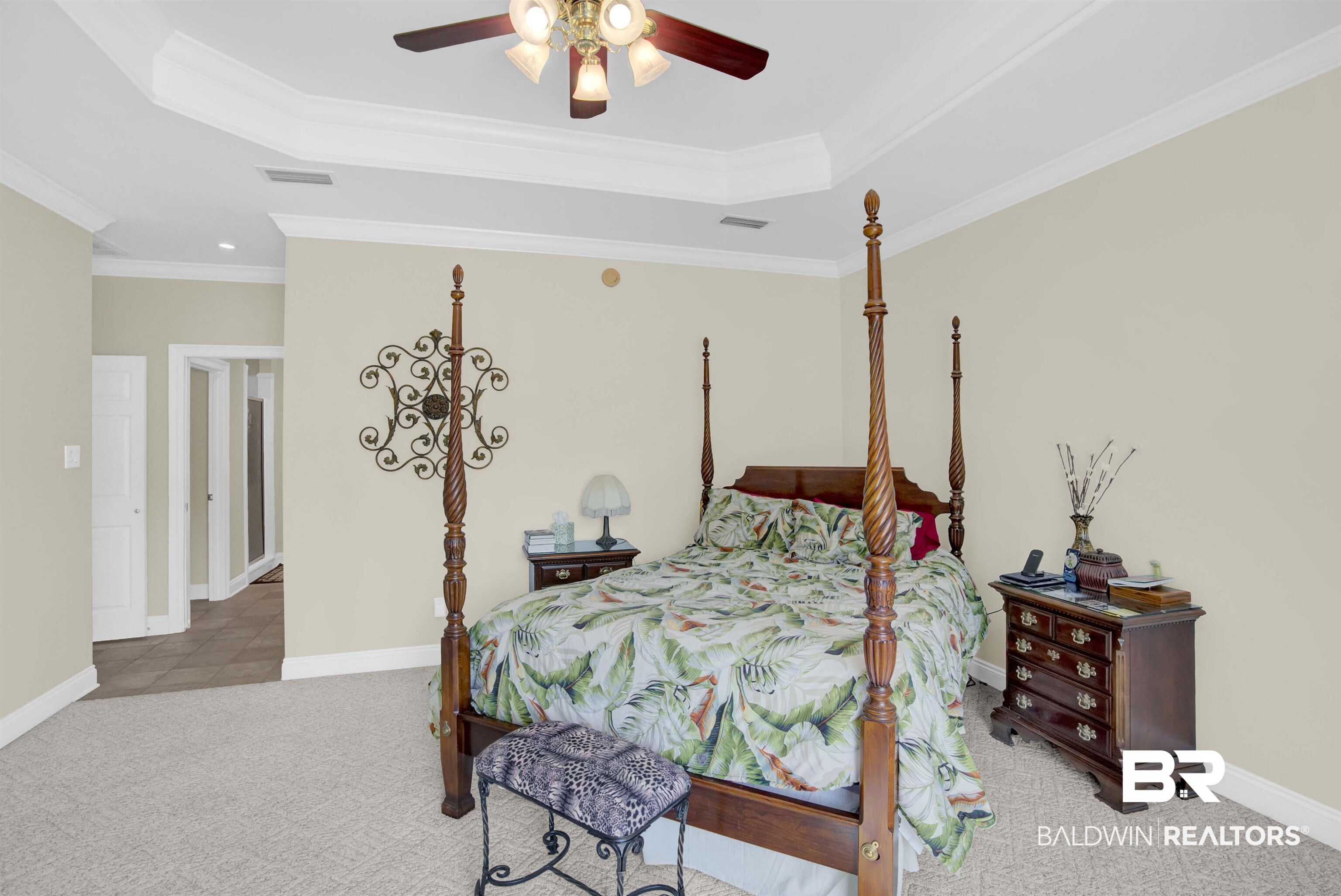 27688 Rigsby Road Daphne, AL 36526 - Photo 26 of 56 Carpeted bedroom with ceiling fan, ornamental molding, and a raised ceiling