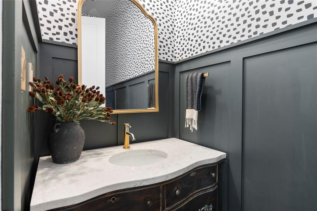 807 Midway Road Tool, TX 75143 - Photo 18 of 39 a bathroom with a sink and a mirror