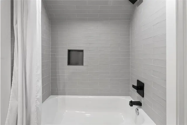 a bathroom with a bathtub