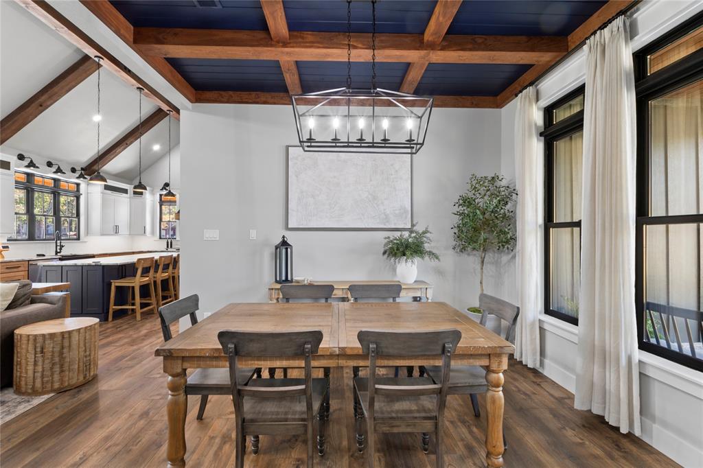 807 Midway Road Tool, TX 75143 - Photo 10 of 39 a view of a dining room with furniture window and wooden floor