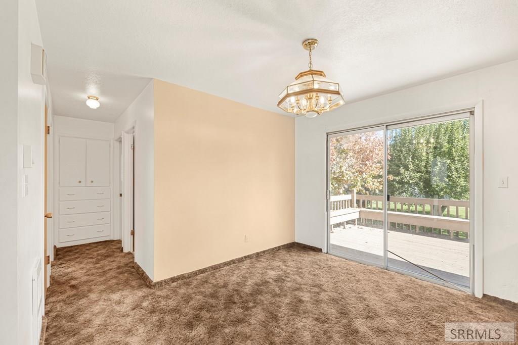 159 Birch Avenue Rexburg, ID 83440 - Photo 10 of 31 Dining Room with Deck Access
