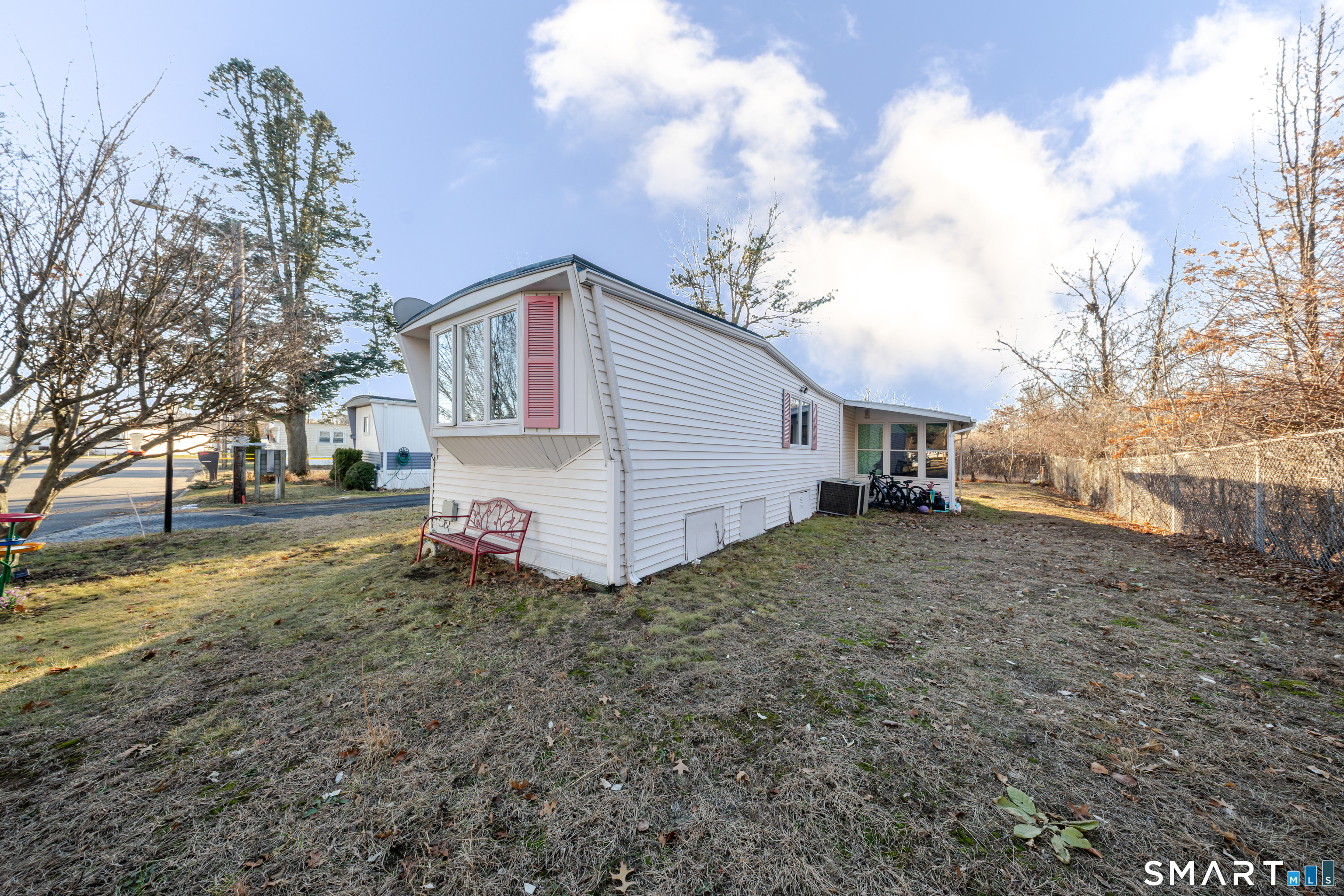 93 Shawnee Road East Hartford, CT 06118 - Photo 25 of 37 a view of a house with a backyard