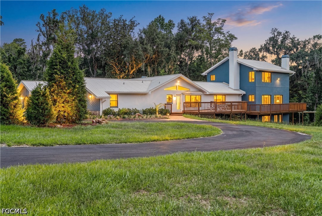 27255 Hickory Hill Road Brooksville, FL 34602 - Photo 45 of 50 a front view of a house with a yard