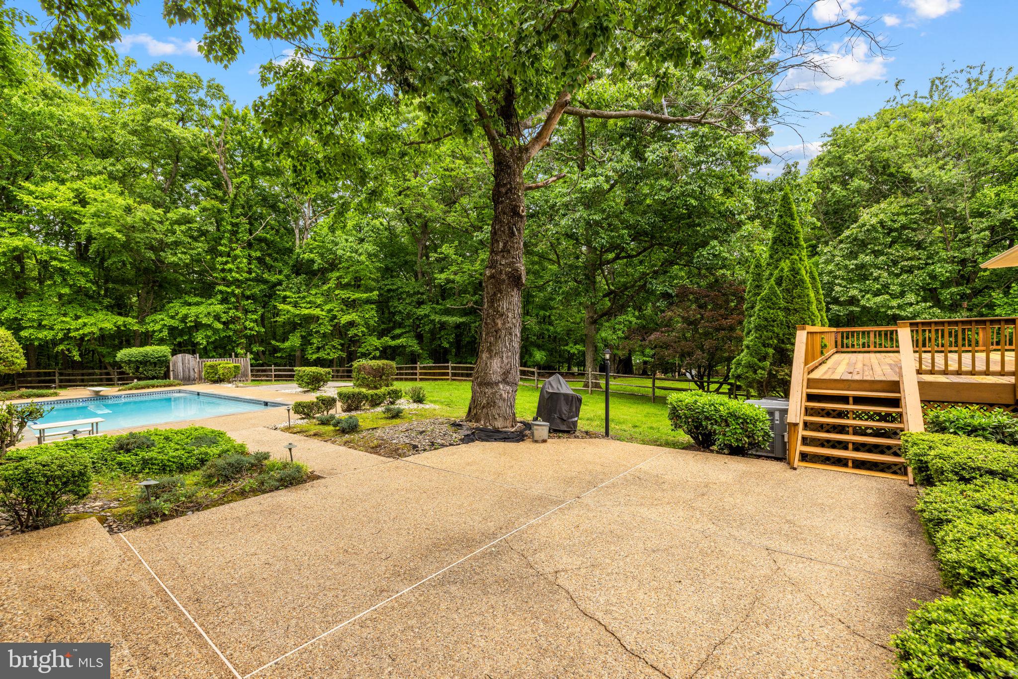 41726 Stumptown Road Leesburg, VA 20176 - Photo 49 of 91 Back Yard Pebble Stone Patio