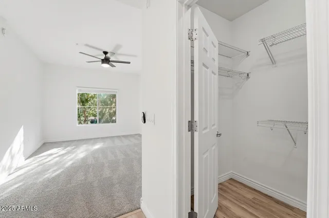 a view of entryway with a fan