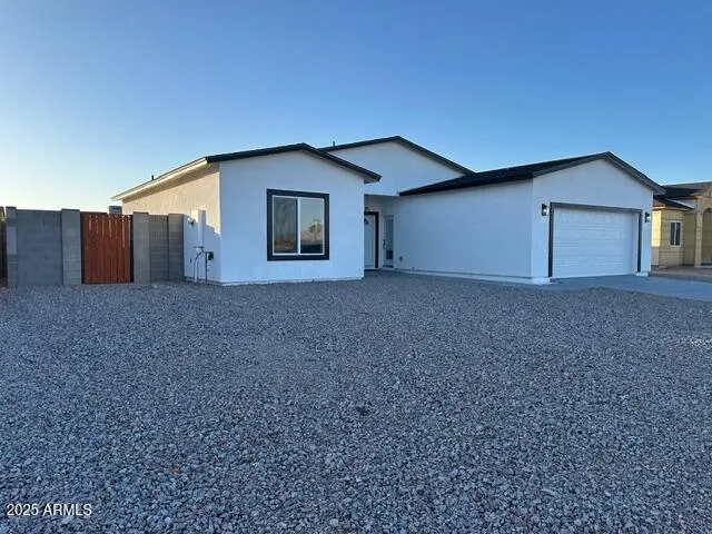 a house view with a backyard