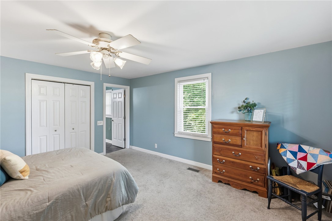108 Tarrant Street Central, SC 29630 - Photo 19 of 42 Well-lit sleeping quarters with plush carpeting and a convenient bi-fold closet.