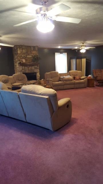 140 Parks Road Portland, TN 37148 - Photo 6 of 19 a living room with furniture and a chandelier