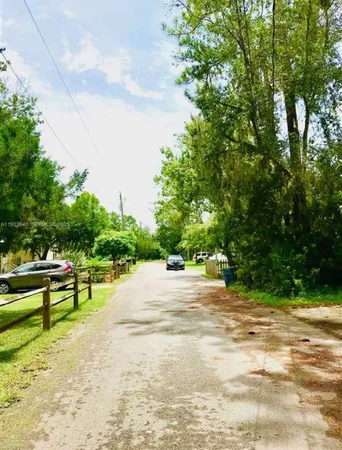 a view of backyard with green space