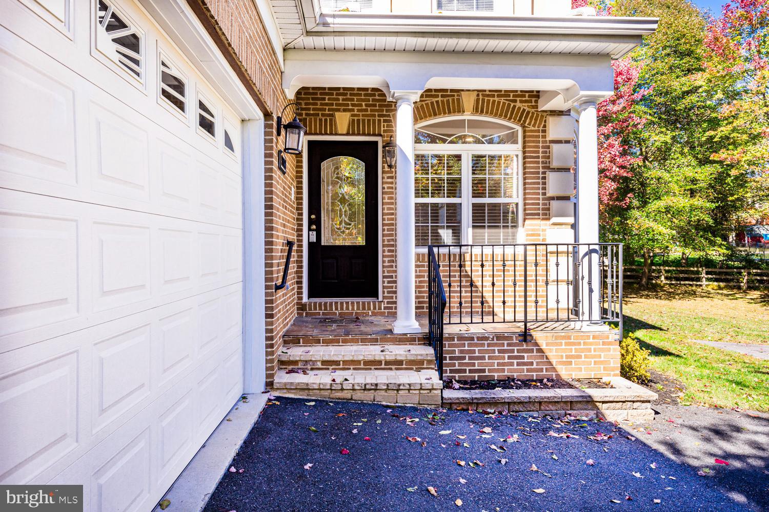 5642 Waterloo Road Columbia, MD 21045 - Photo 2 of 67 Charming entrance with seasonal foliage.
