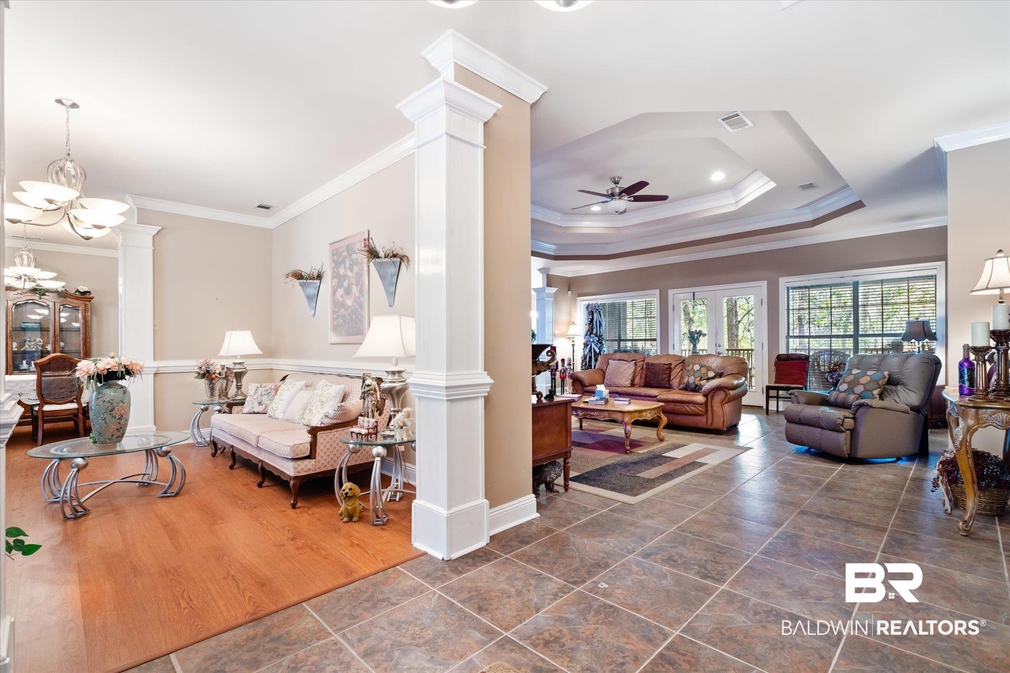 2400 Waterford Road Semmes, AL 36575 - Photo 2 of 30 Living area featuring decorative columns, ornamental molding, and a ceiling fan