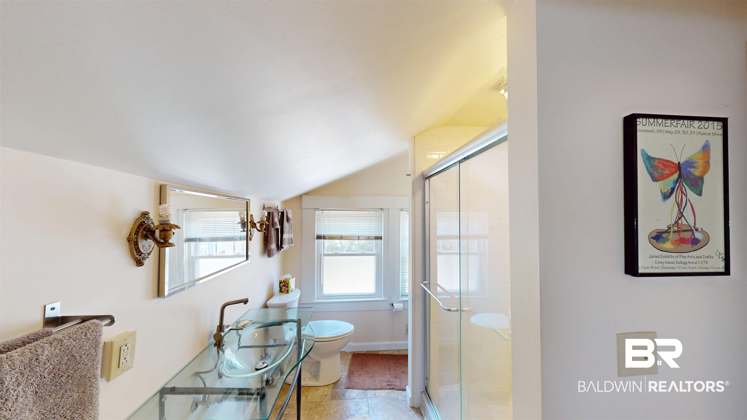 3220 Bayfront Road Mobile, AL 36605 - Photo 19 of 43 Primary Bathroom with a stall shower, lofted ceiling, and vanity