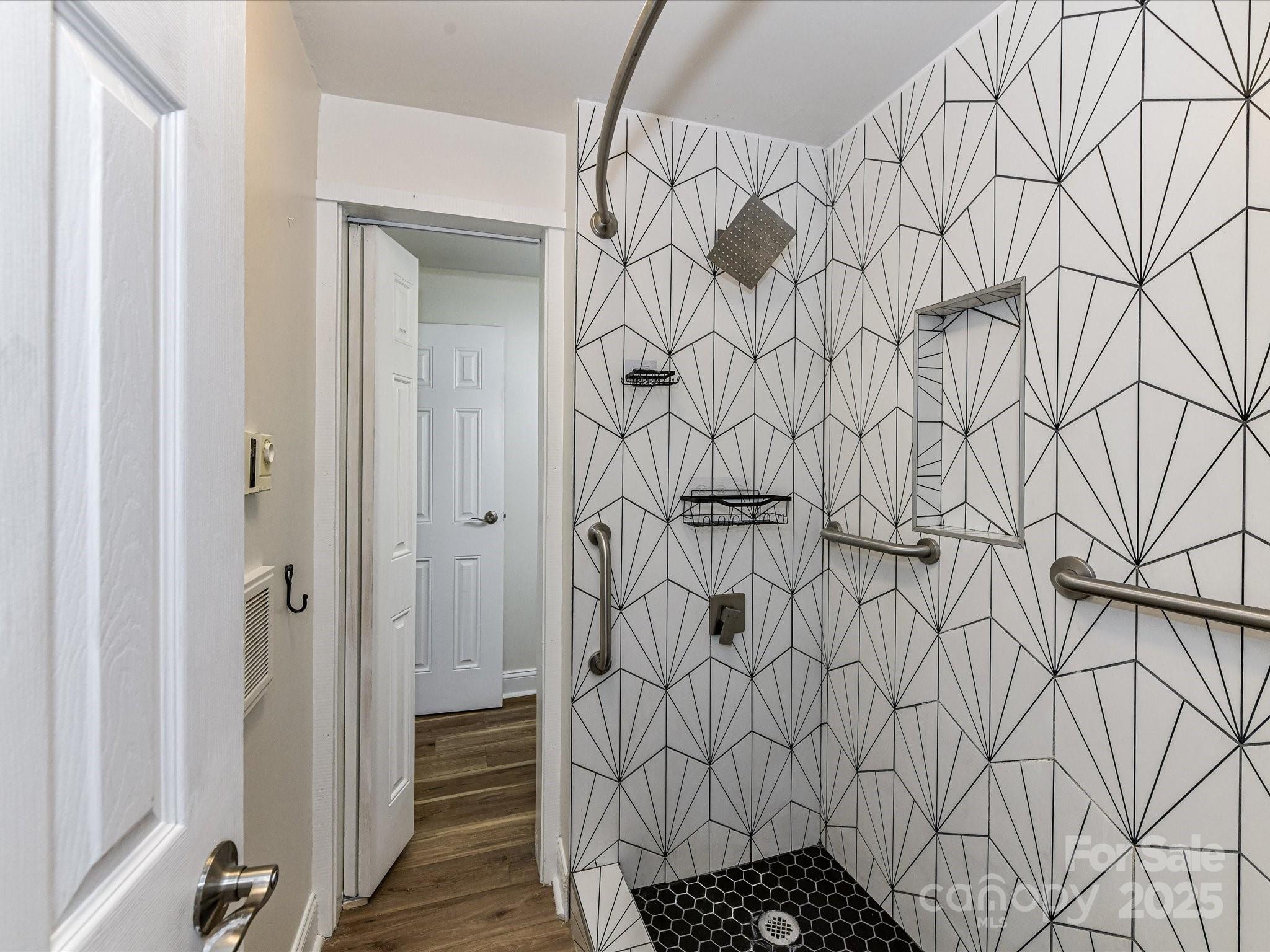 1300 Reece Road, Unit 111 Charlotte, NC 28209 - Photo 20 of 29 a bathroom with a sink and a mirror