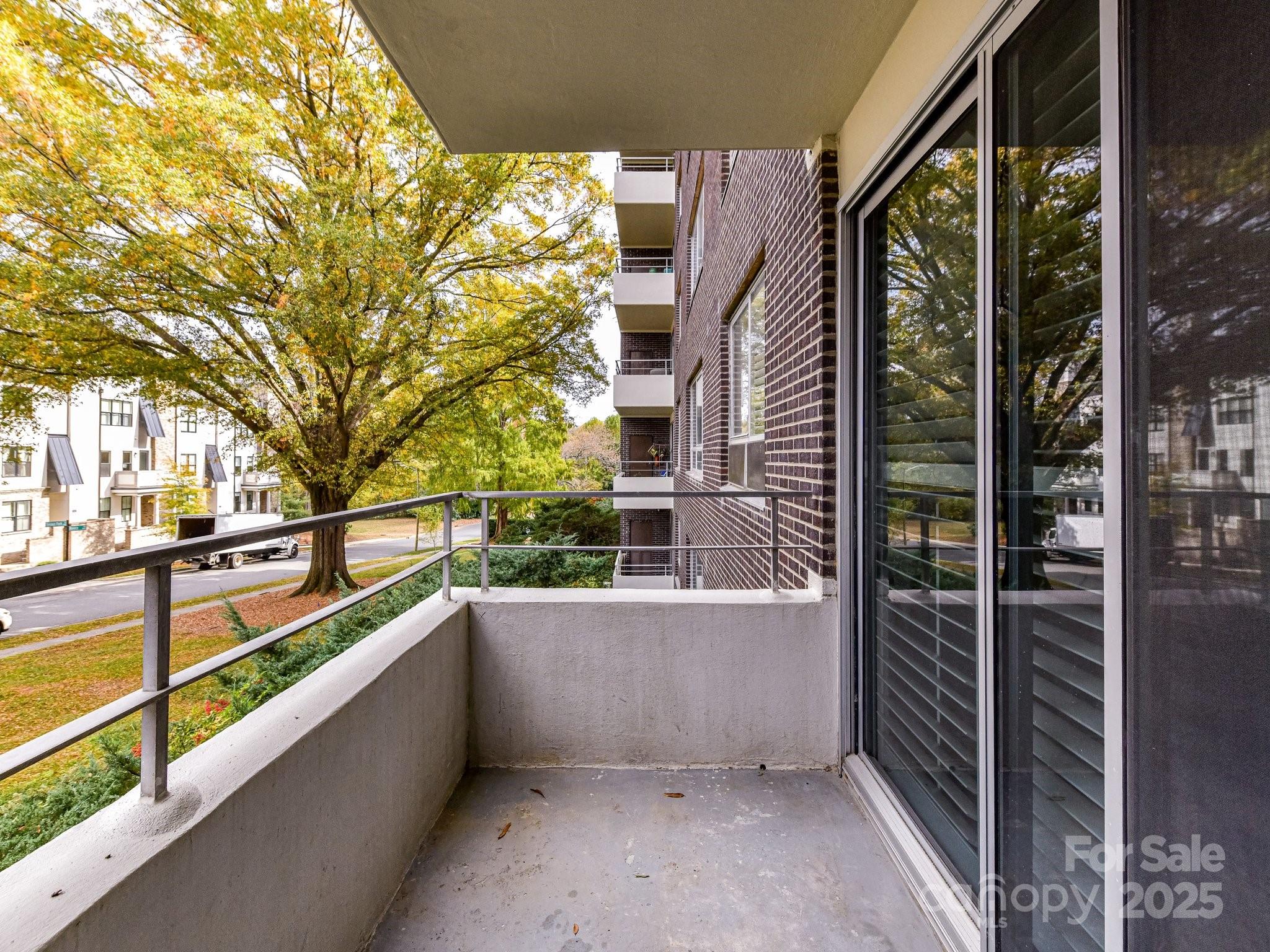1300 Reece Road, Unit 111 Charlotte, NC 28209 - Photo 23 of 29 a view of balcony