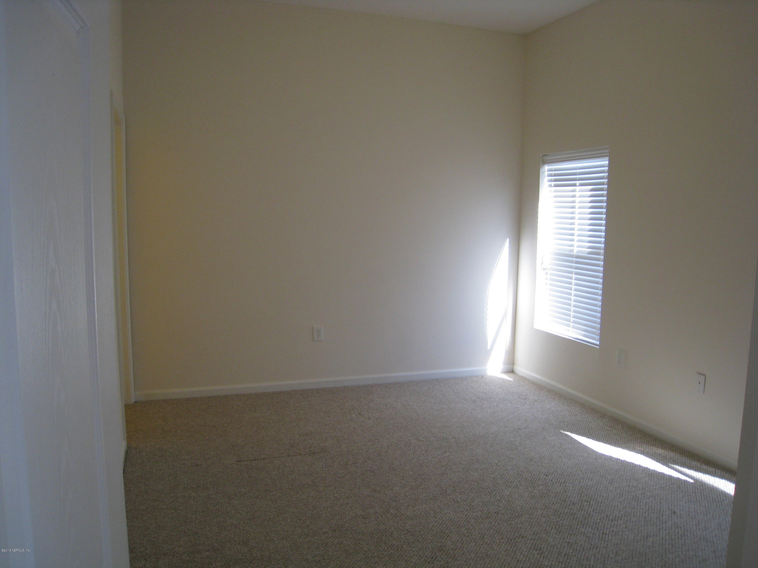7920 Merrill Road, Unit 2203 Jacksonville, FL 32277 - Photo 5 of 13 MASTER BED