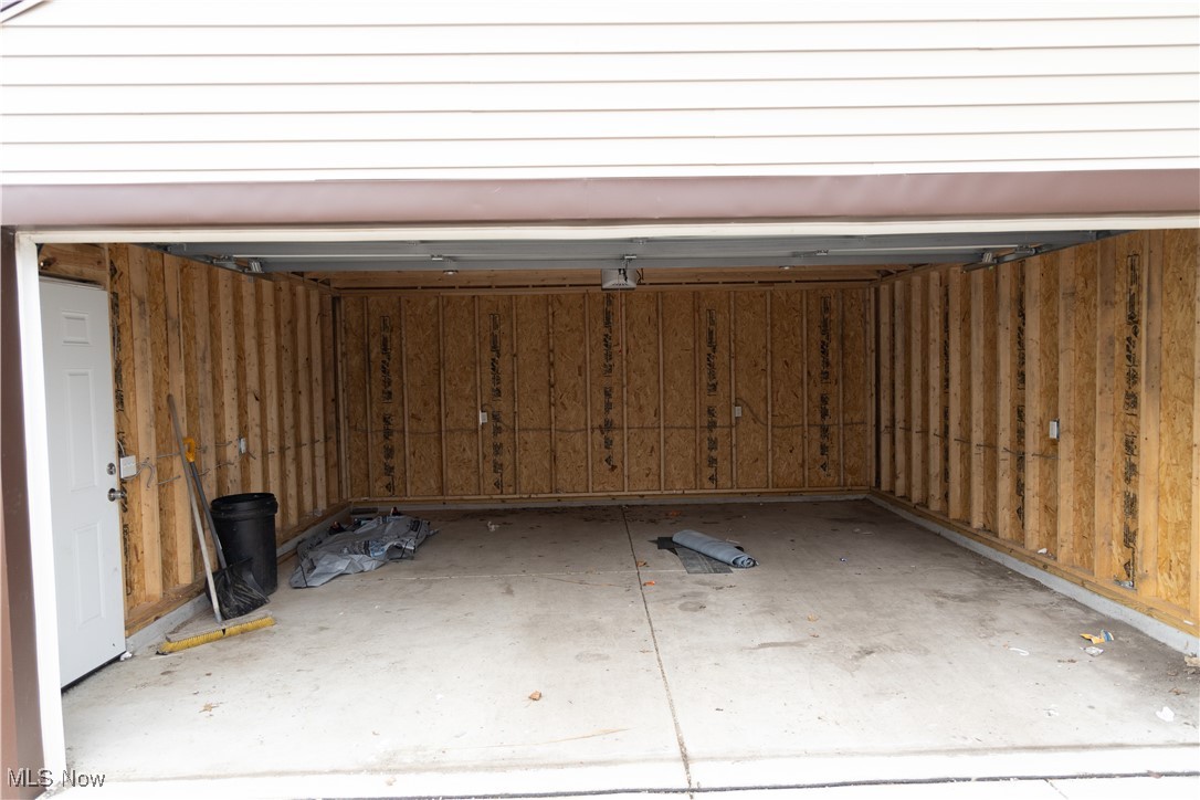 1000 Quilliams Road Cleveland, OH 44121 - Photo 32 of 34 Garage with wooden walls